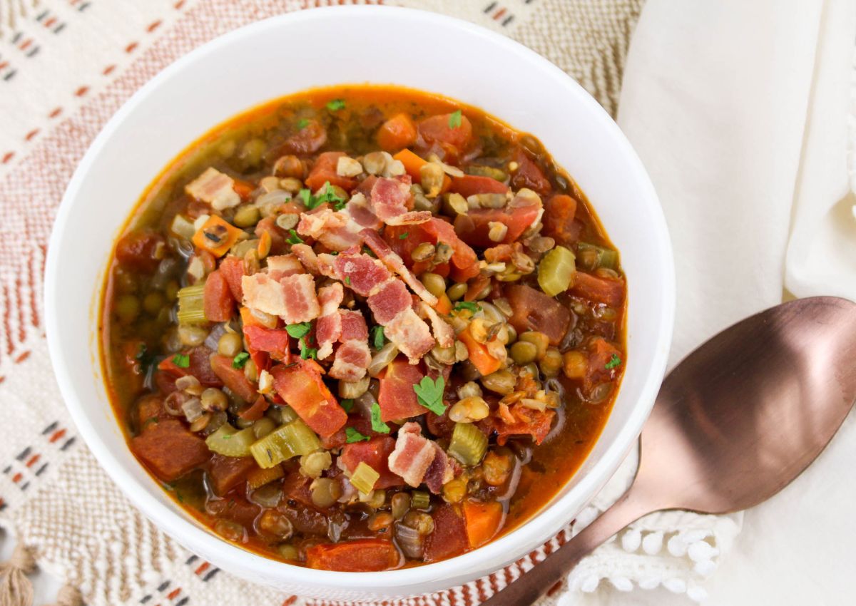 Bowl full of bacon lentil soup.