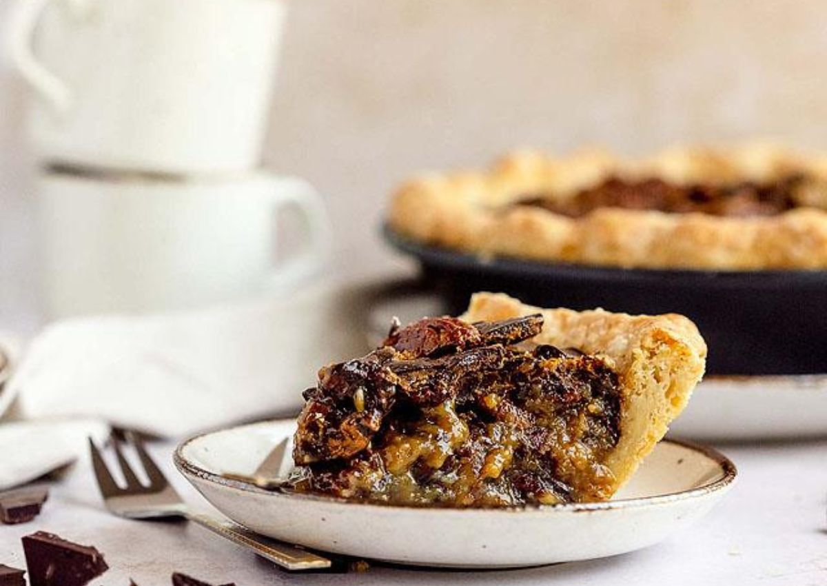 Slice of chocolate pecan pie.