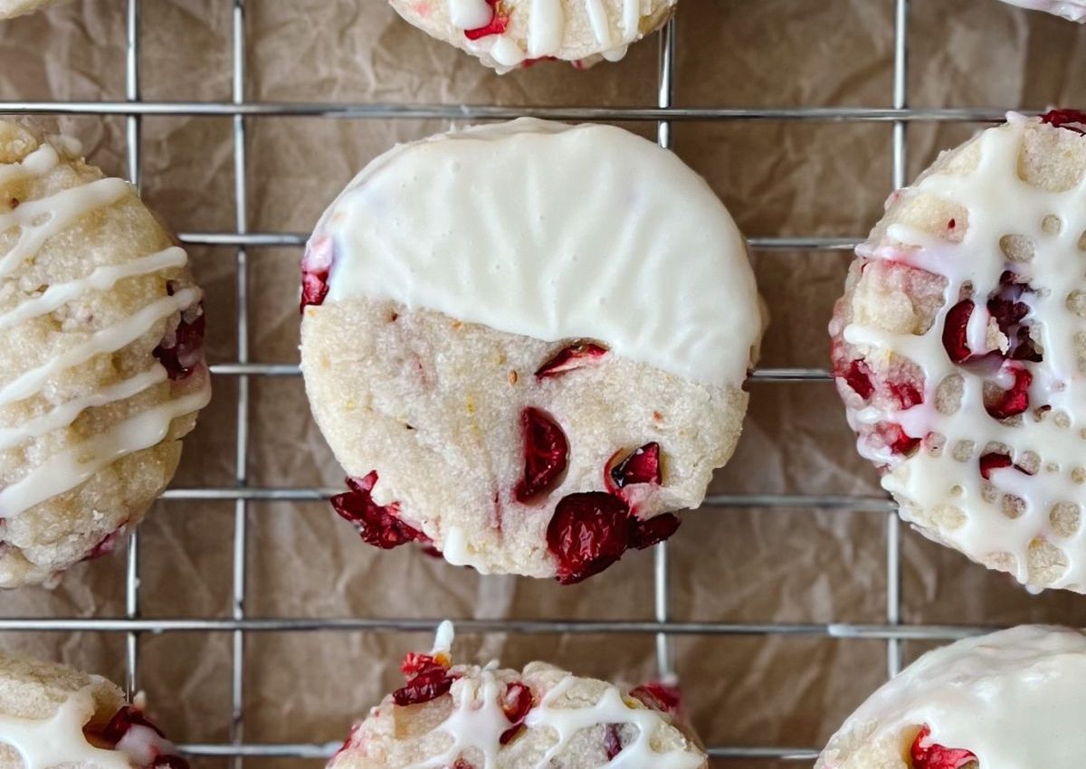 Cranberry orange cookies on rack.