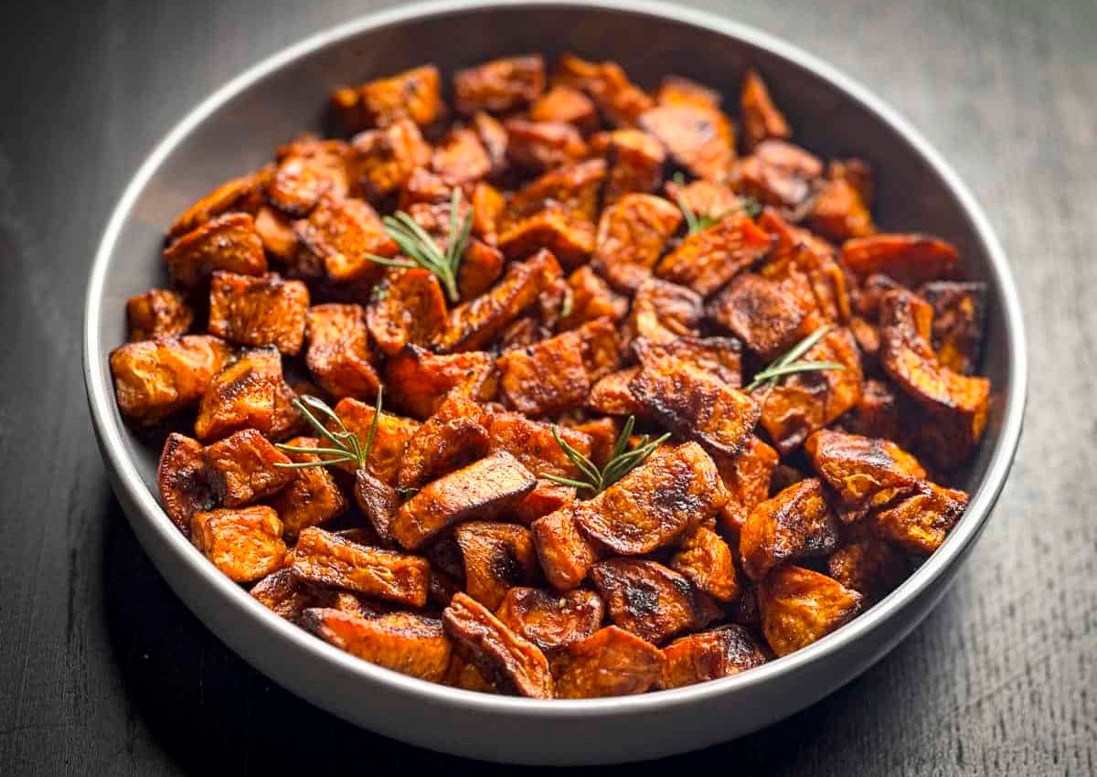 Roasted sweet potatoes in bowl.