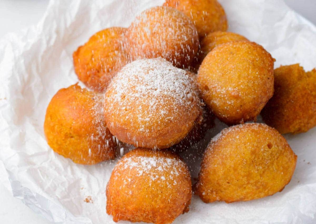Pumpkin fritters on a plate.