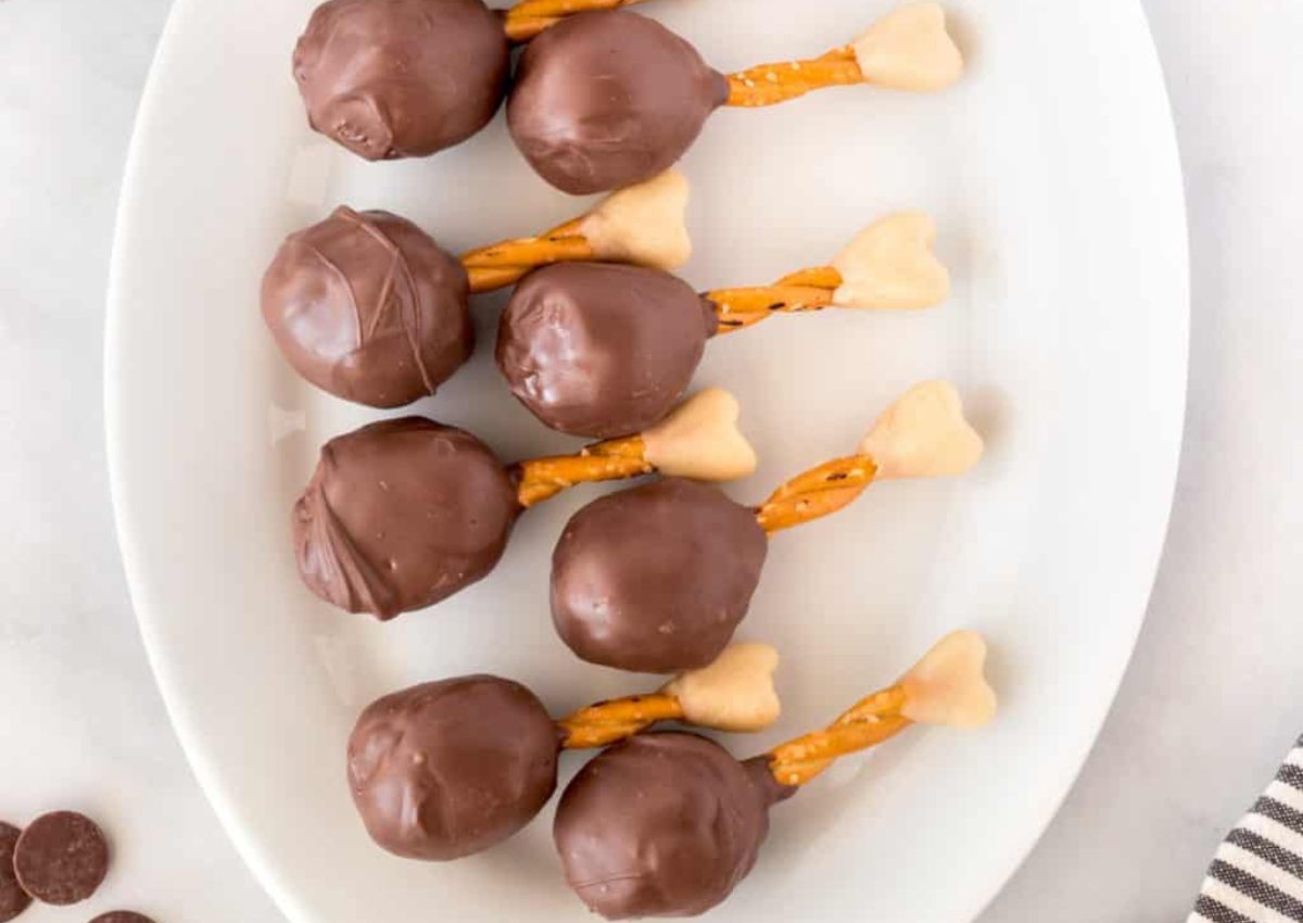 Candy turkey drumsticks on plate.