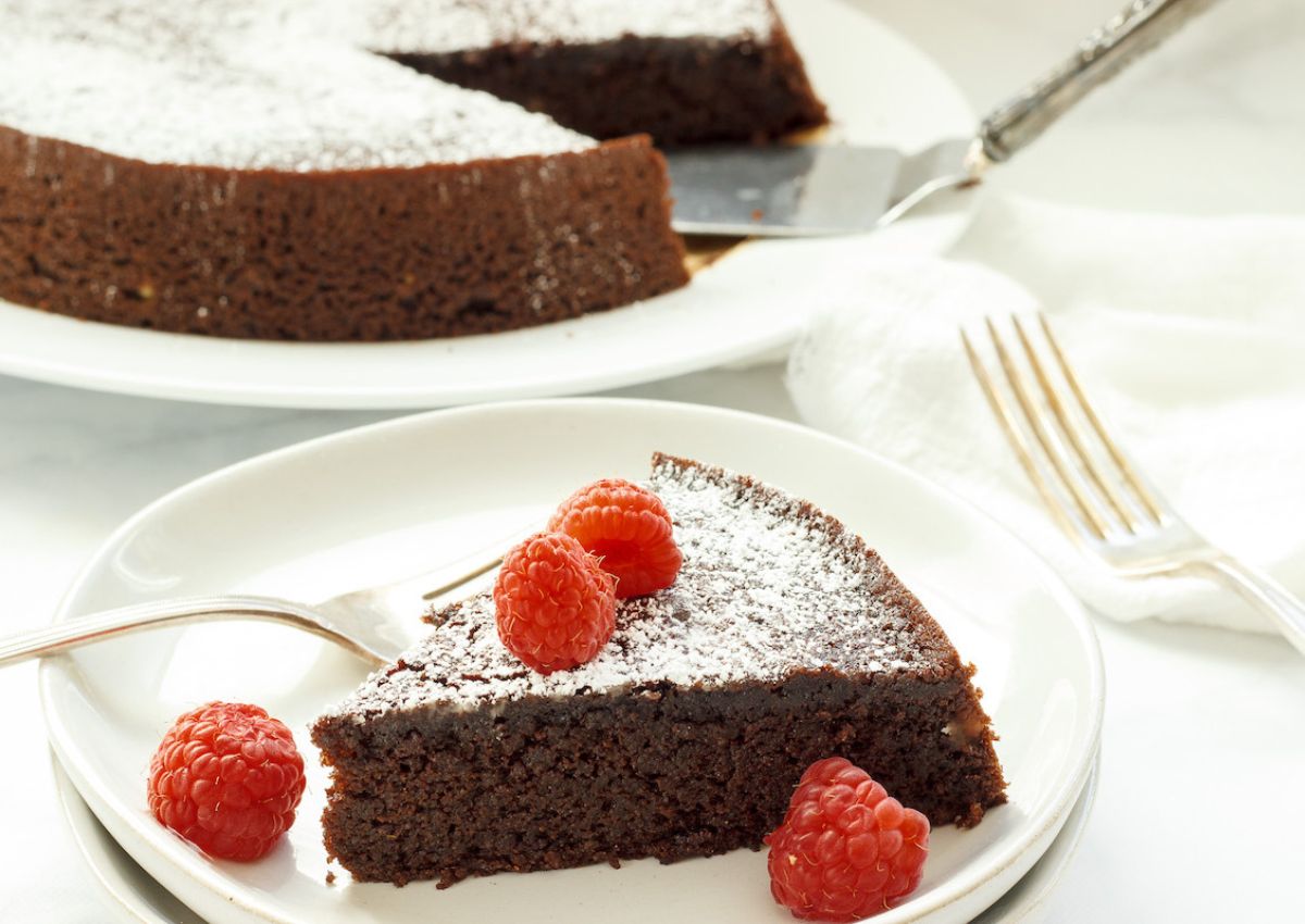 Slice of chocolate torte on a plate.