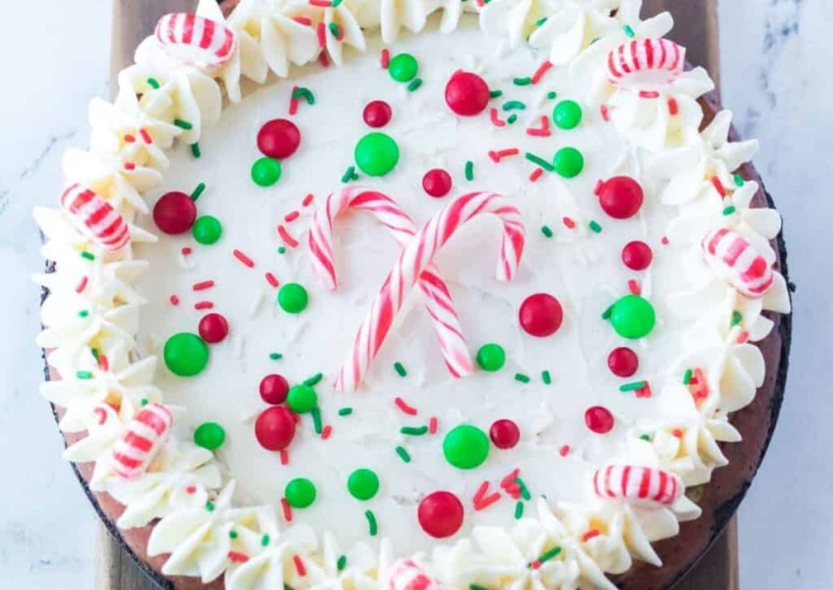 Christmas cheesecake on a counter.