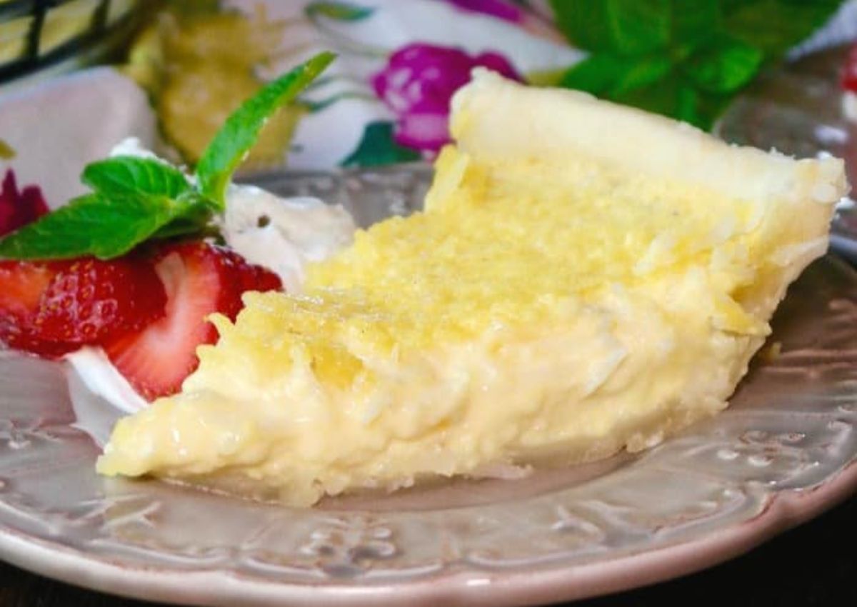 Slice of coconut pie on a plate.