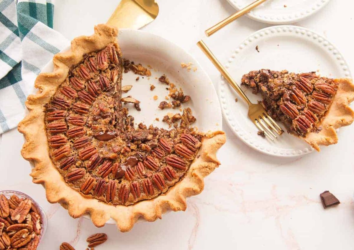 Slice of maple pecan pie on a plate.