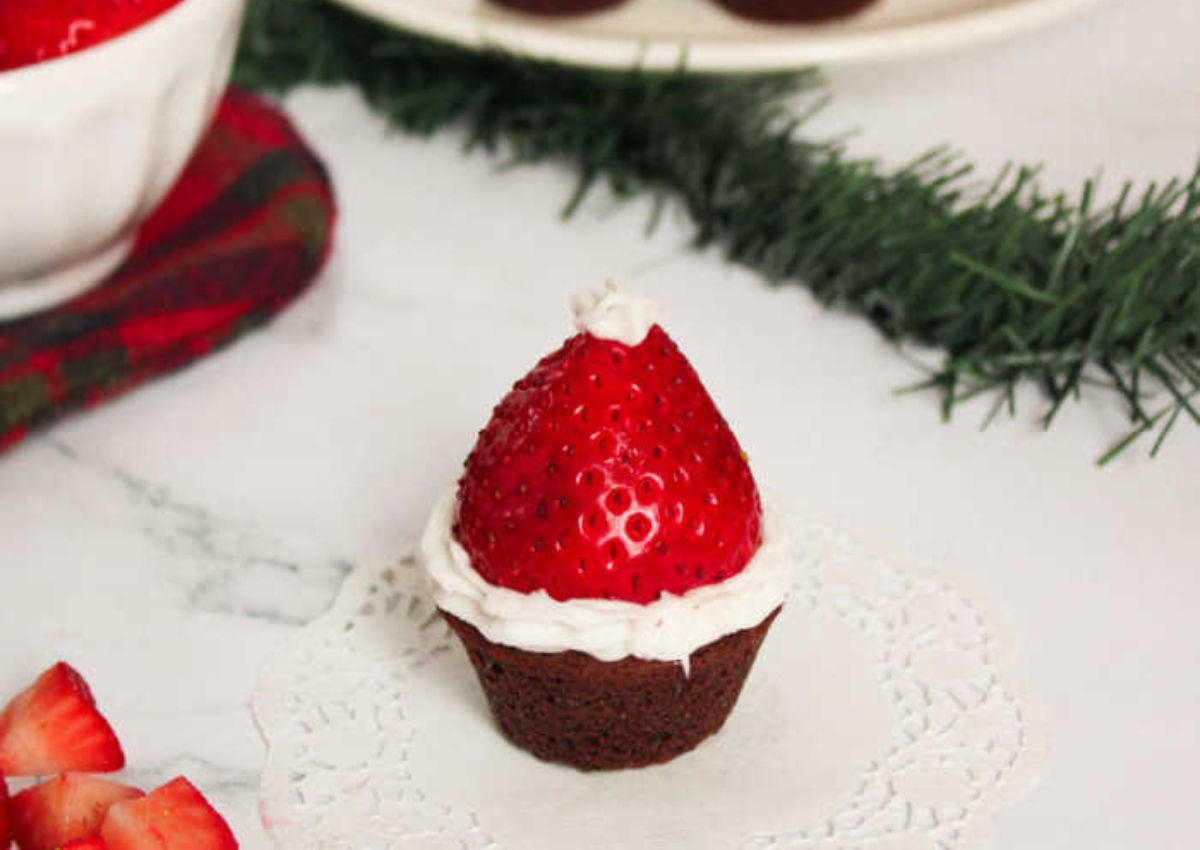Santa hat brownies on a table.