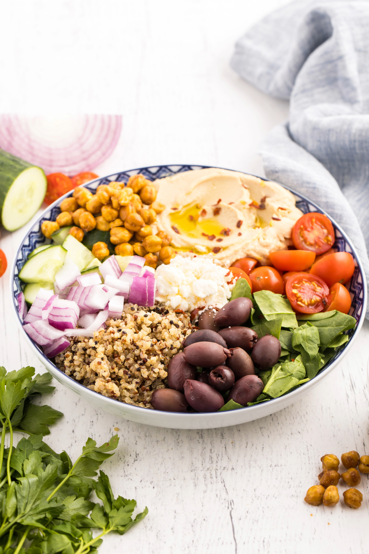 Healthy bowl of Mediterranean ingredients with chickpeas.