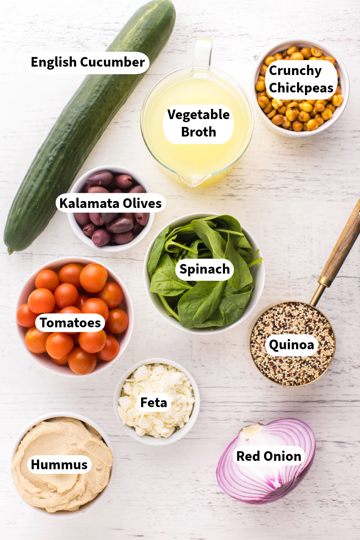 Top overhead view of ingredients to make Mediterranean bowls.