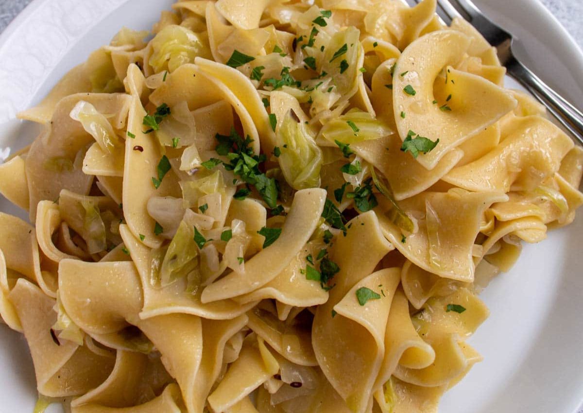 Bowl of cabbage and noodles.