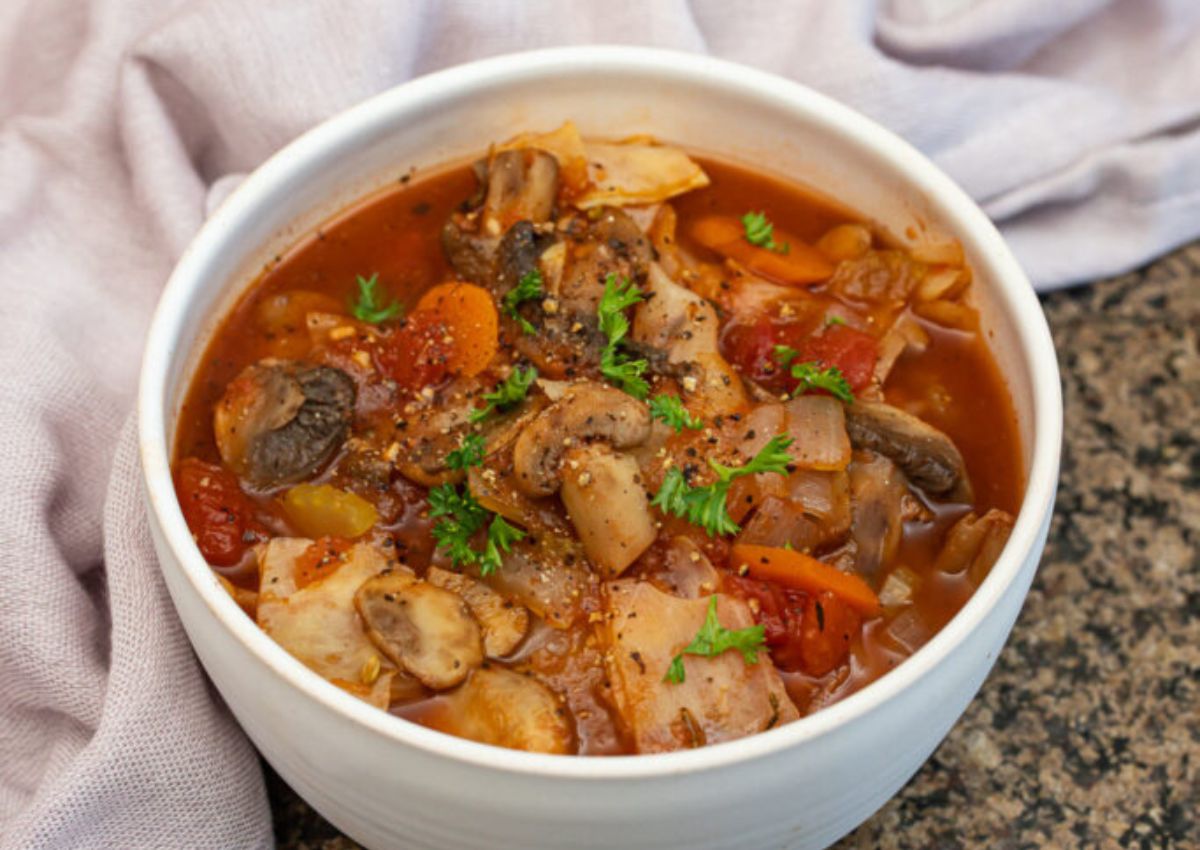 Bowl of cabbage mushroom soup.