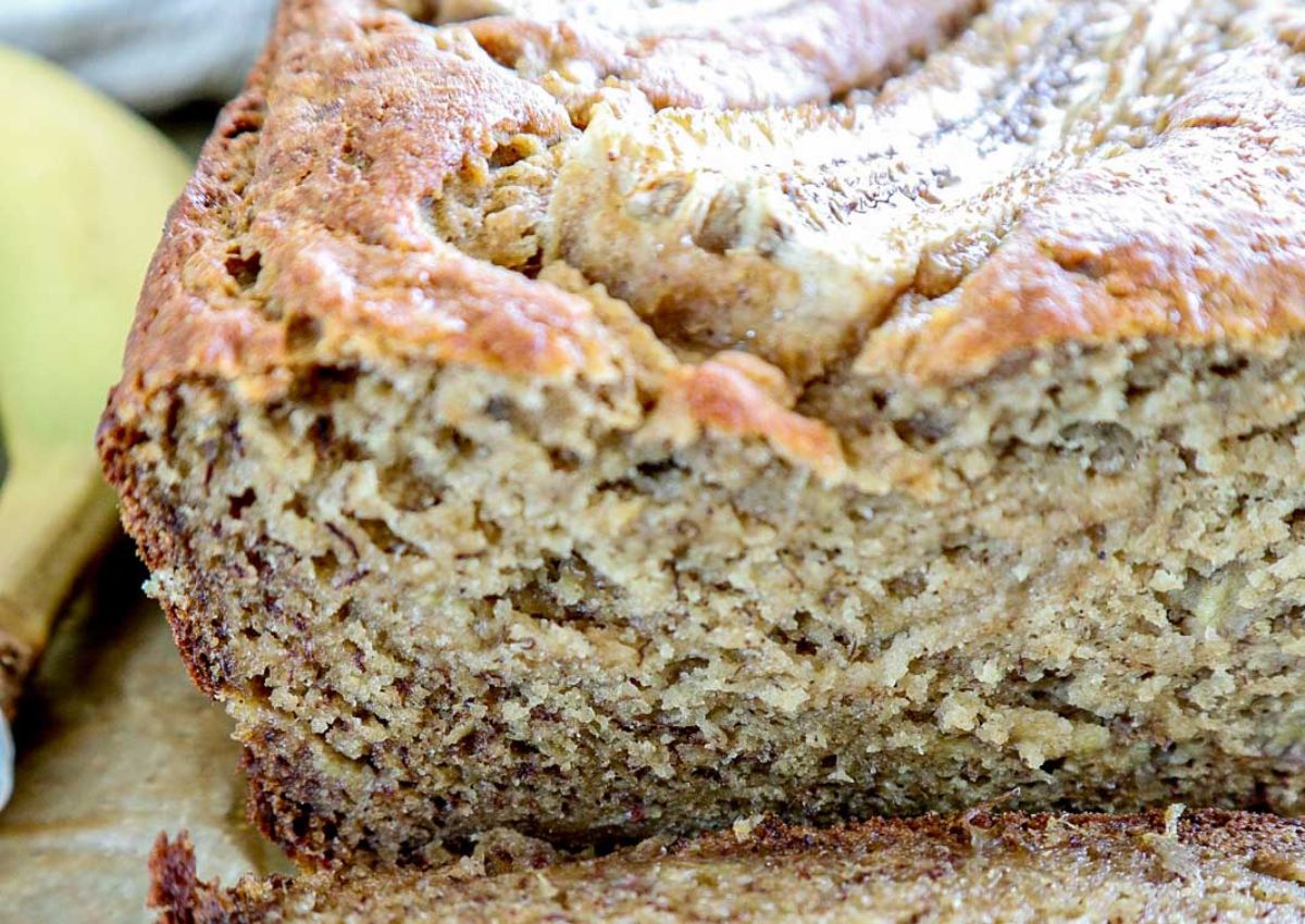 Slice of cottage cheese banana bread on a plate.