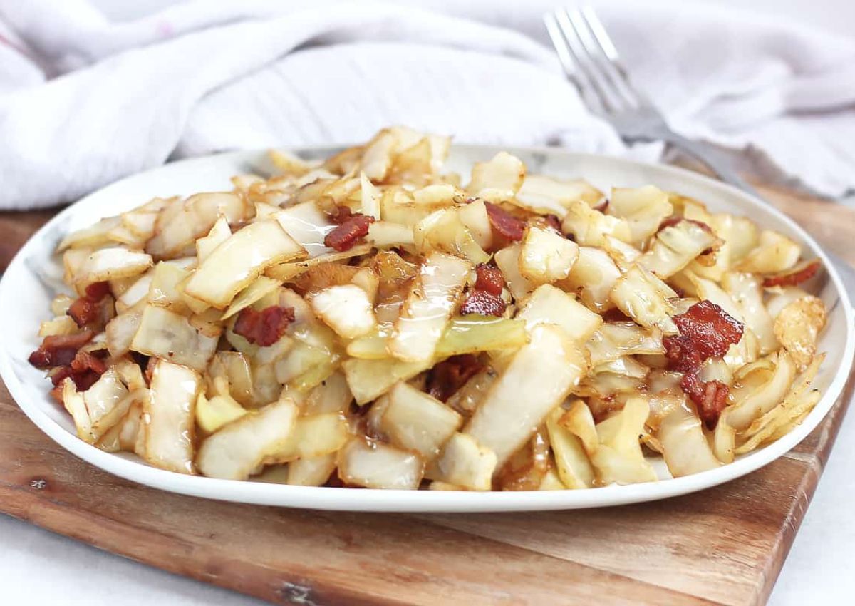 Plate full of german fried cabbage.
