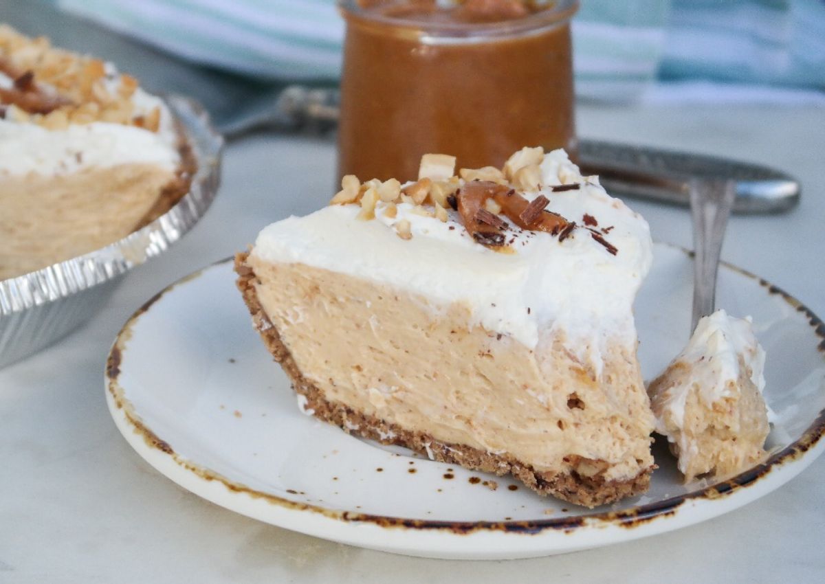 Slice of keto peanut butter pie on a plate.
