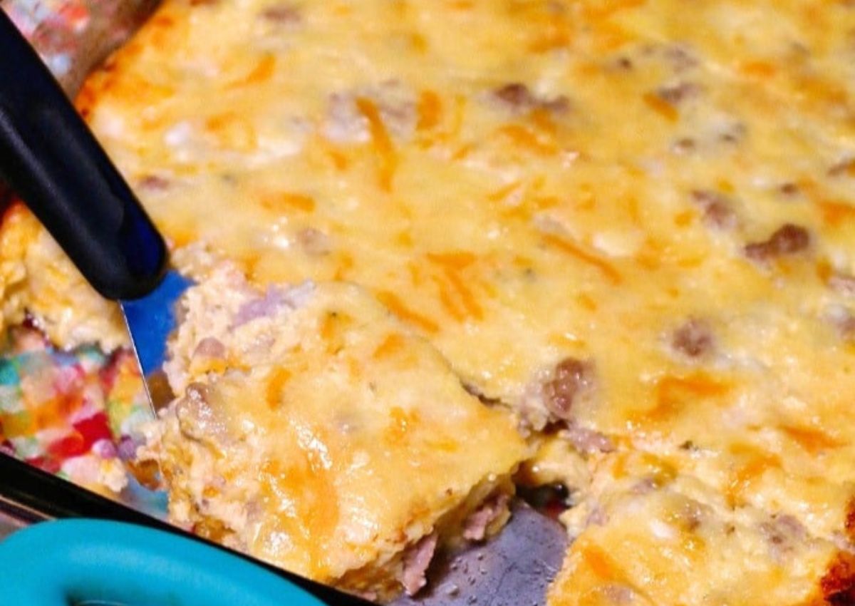 Casserole dish full of sausage casserole.