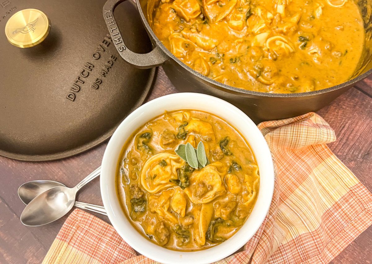Small bowl of sausage butternut tortellini soup.