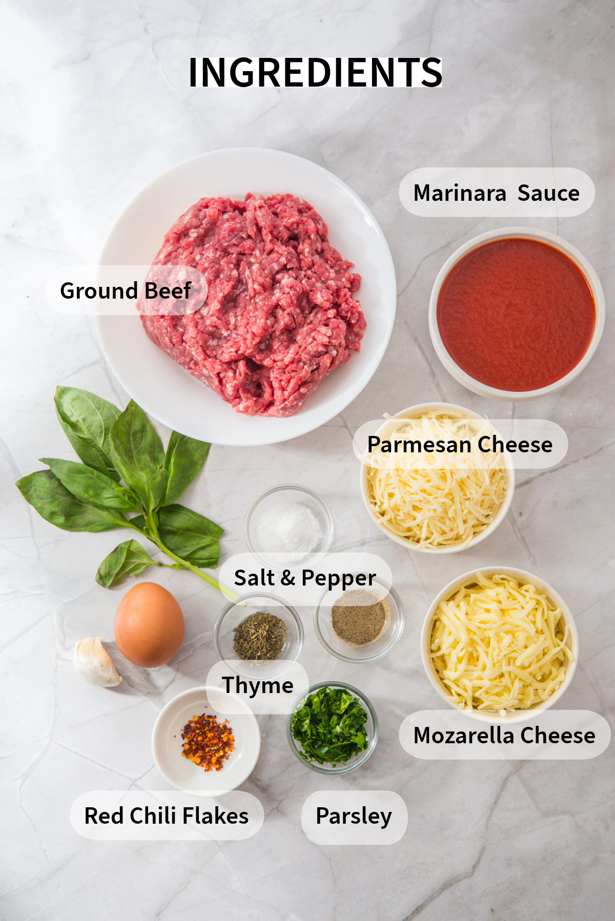 Top view of all ingredients needed to make meatballs.