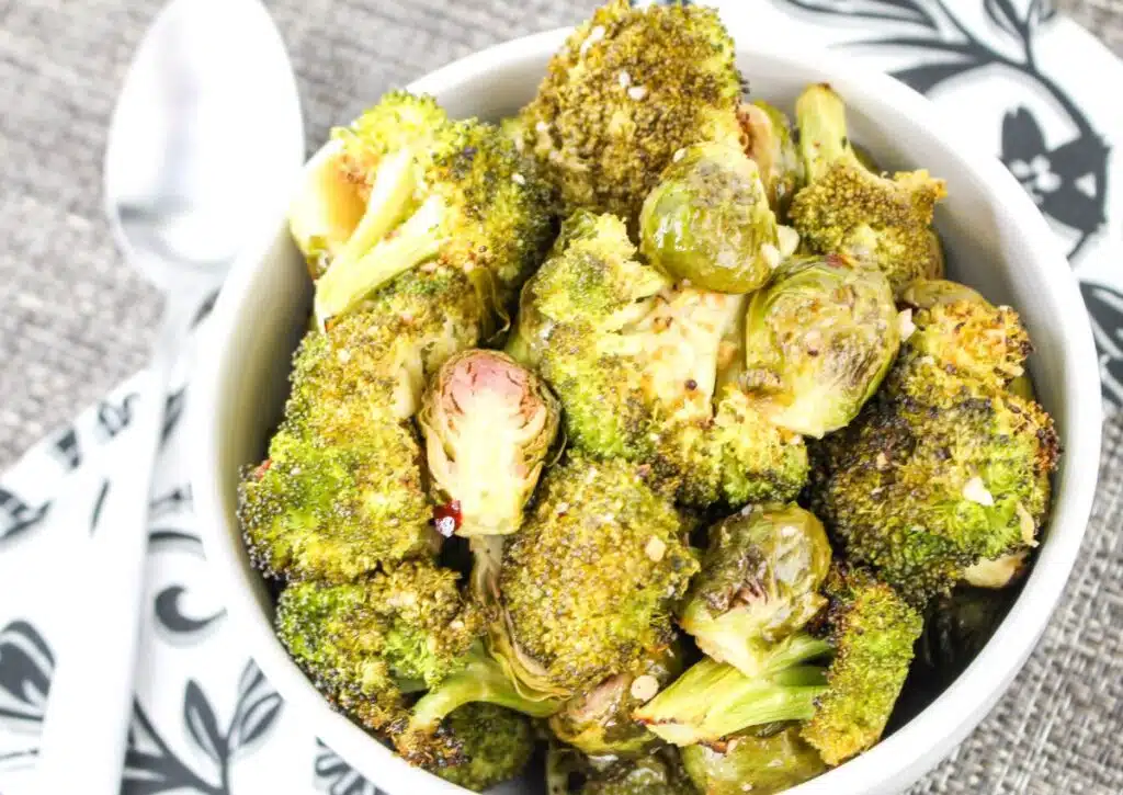 Bowl full of brussels sprouts and broccoli. 