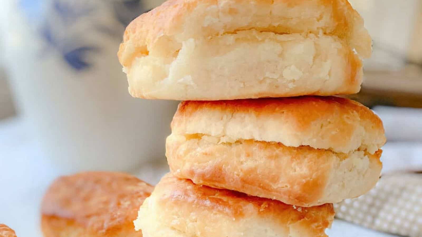 Buttermilk biscuits stacked on top of each other,