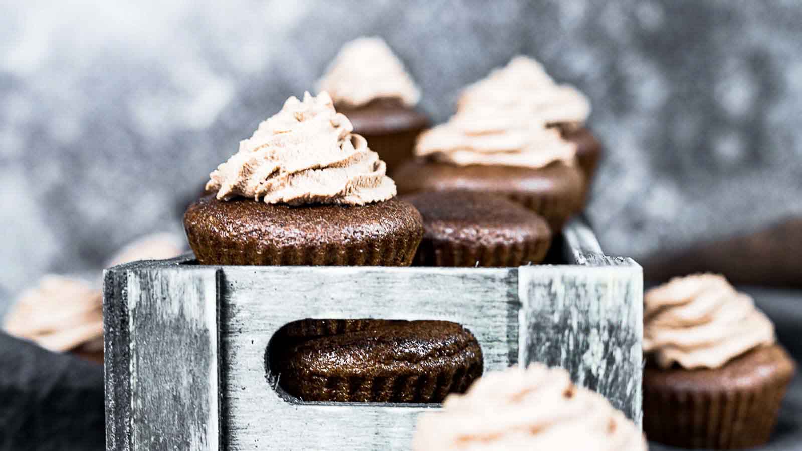 Chocolate cupcakes in a wooden box.