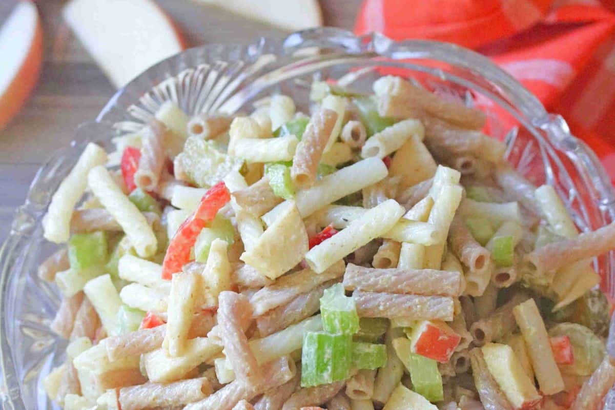 Glass bowl full of dairy free macaroni salad.