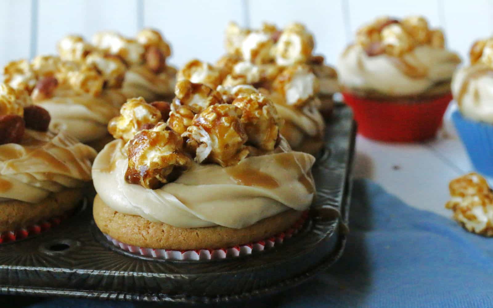 Cupcakes topped with caramel popcorn.