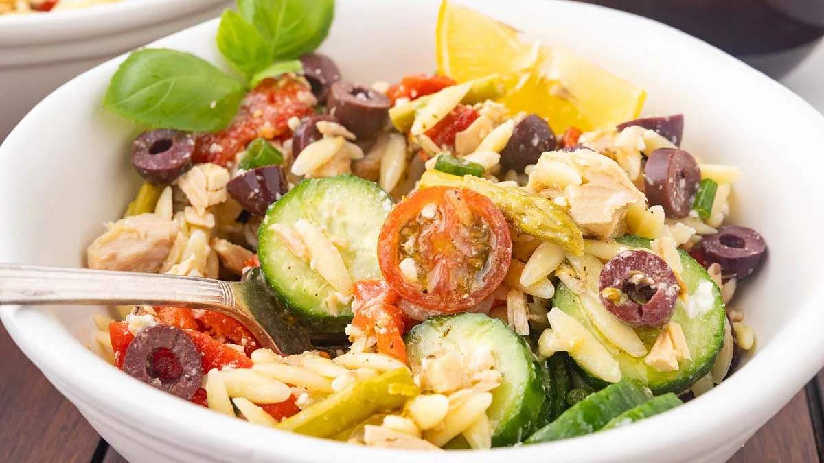 Tuna Orzo Salad in a small white bowl.