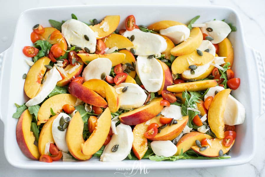 Peach and Tomato Saladi n a large white baking dish.