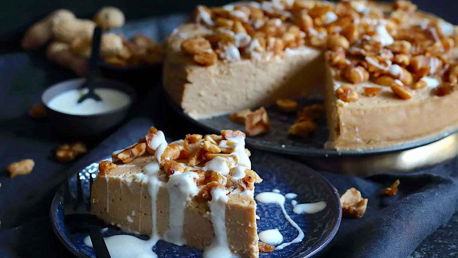 Slice of peanut butter cheesecake on a blue plate.