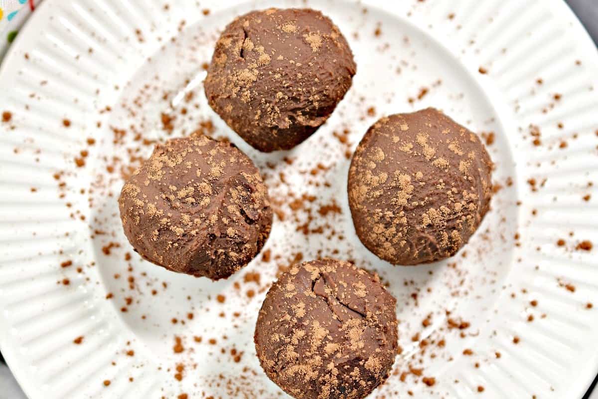 Peanut butter truffles in a white plate.