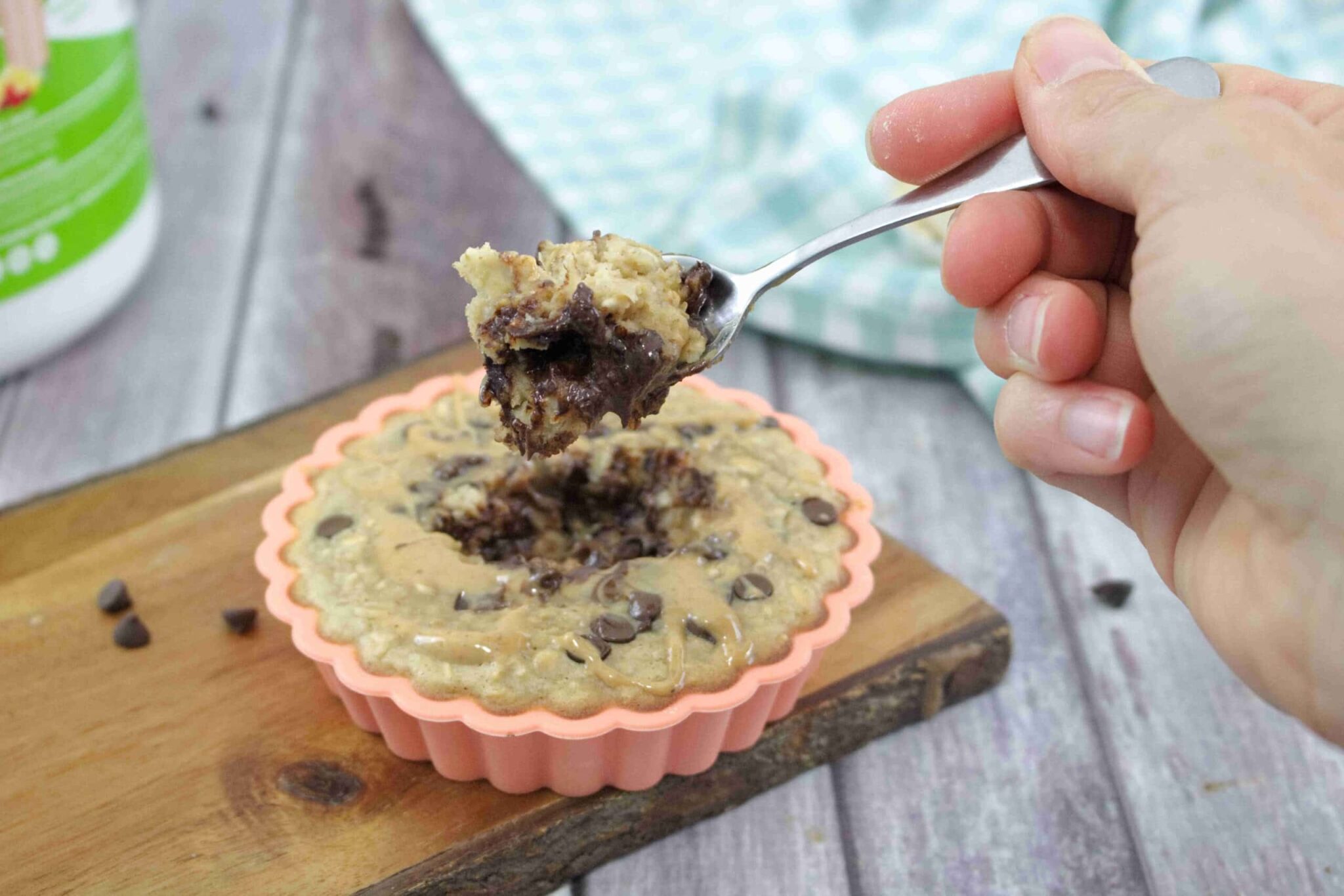 Small bowl of peanut butter chocolate chip baked oatmeal.