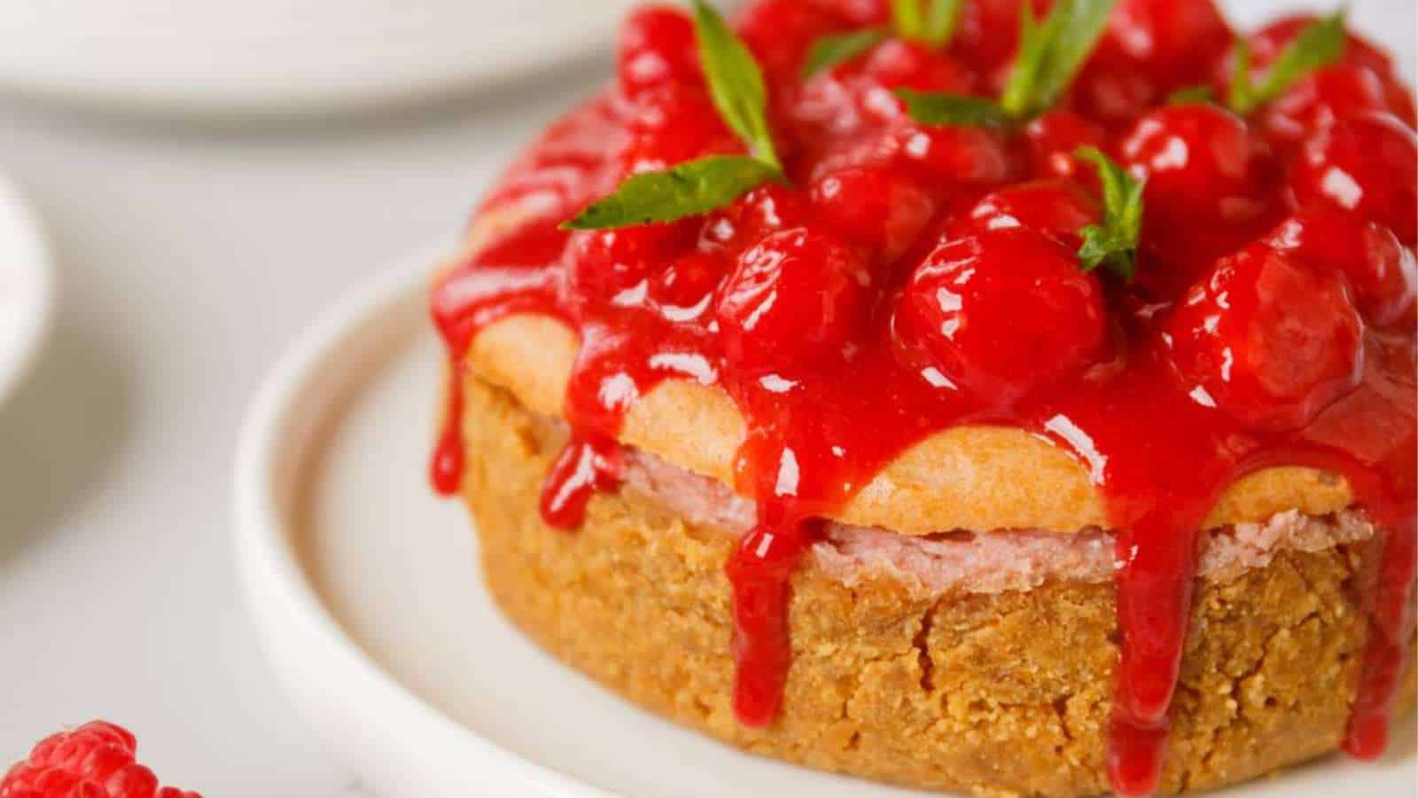 Raspberry lemon cheesecake on a serving tray.
