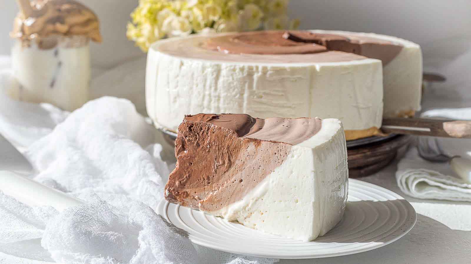Slice of yogurt cheesecake on a small plate.