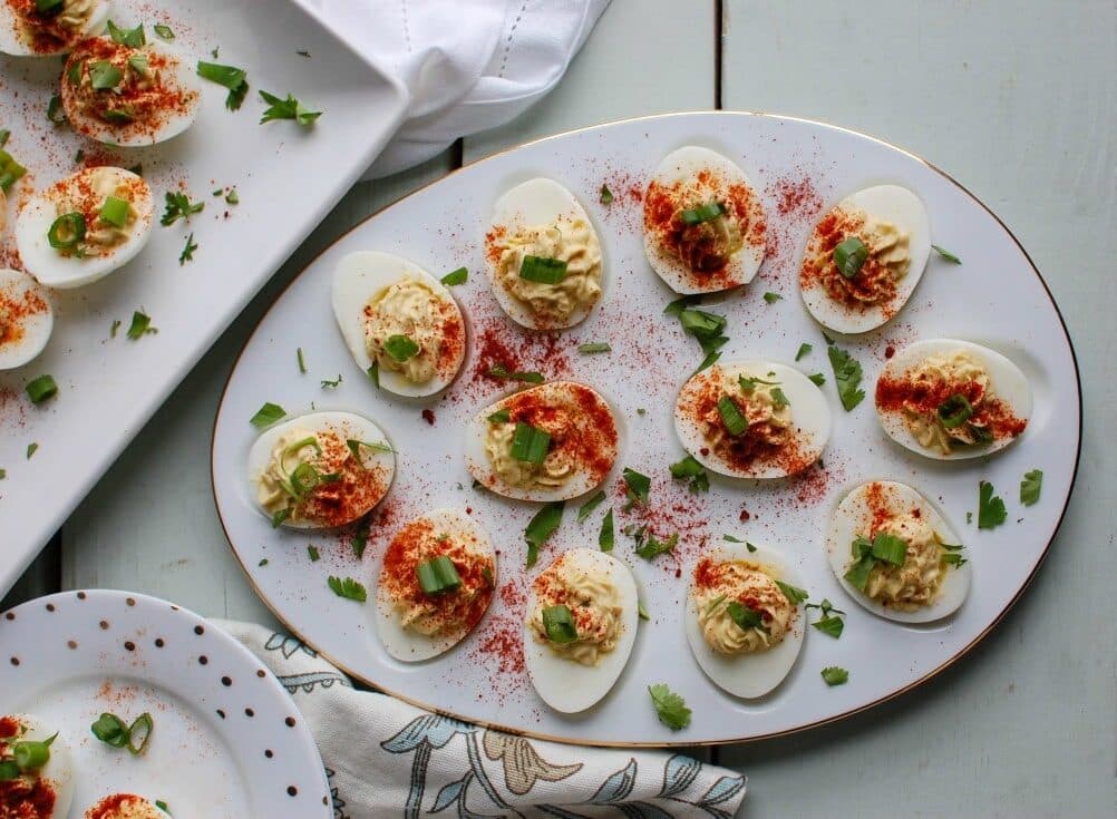 Deviled eggs on a serving tray ready to serve.