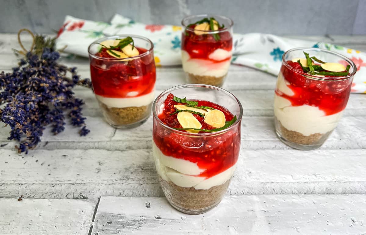 Cheesecake parfaits in glass cups.