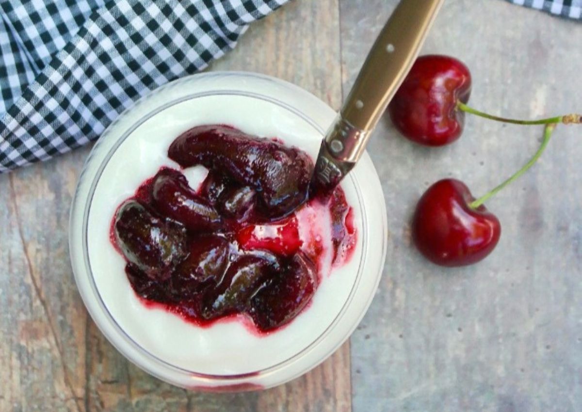 Cherry compote on top of a custard.
