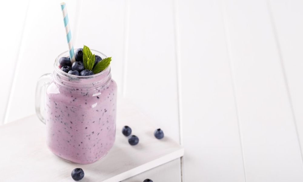 Mason jar full of low carb avocado smoothie.