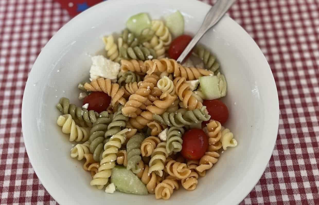 Bowl full of pasta salad.