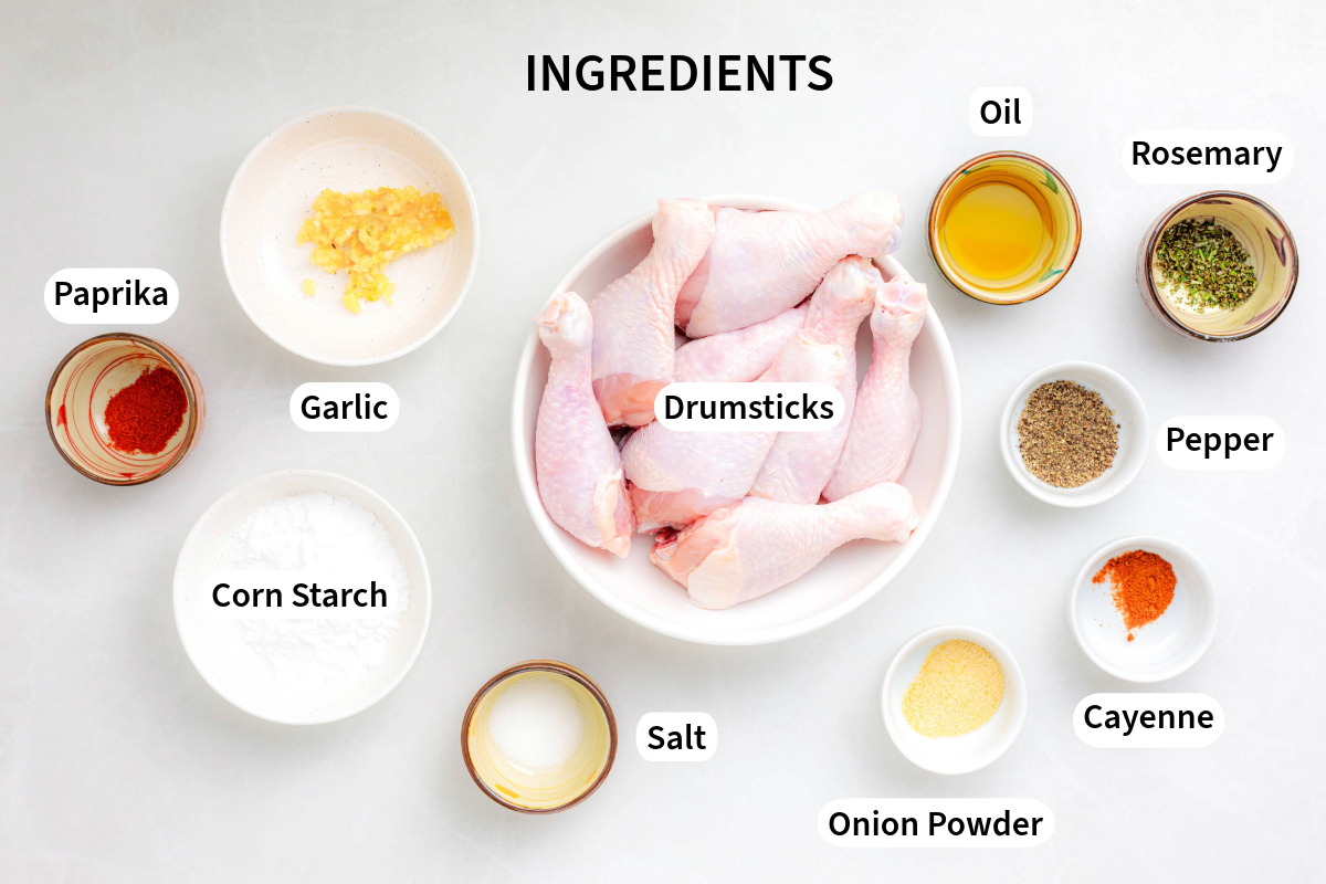 Overhead view of ingredients to make oven baked drumsticks.
