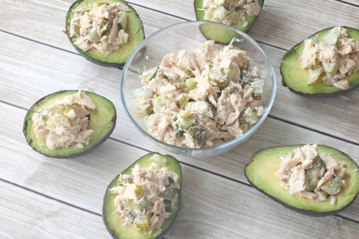 Avocado halves stuffed with tuna salad.