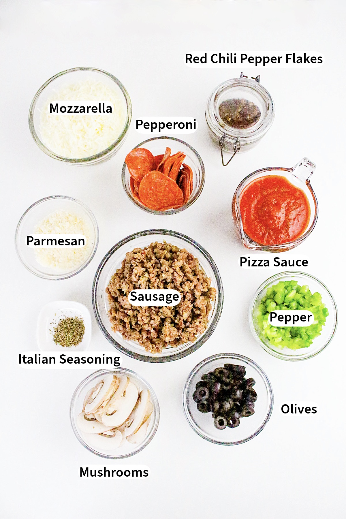 Top view of ingredients for pizza bowls.