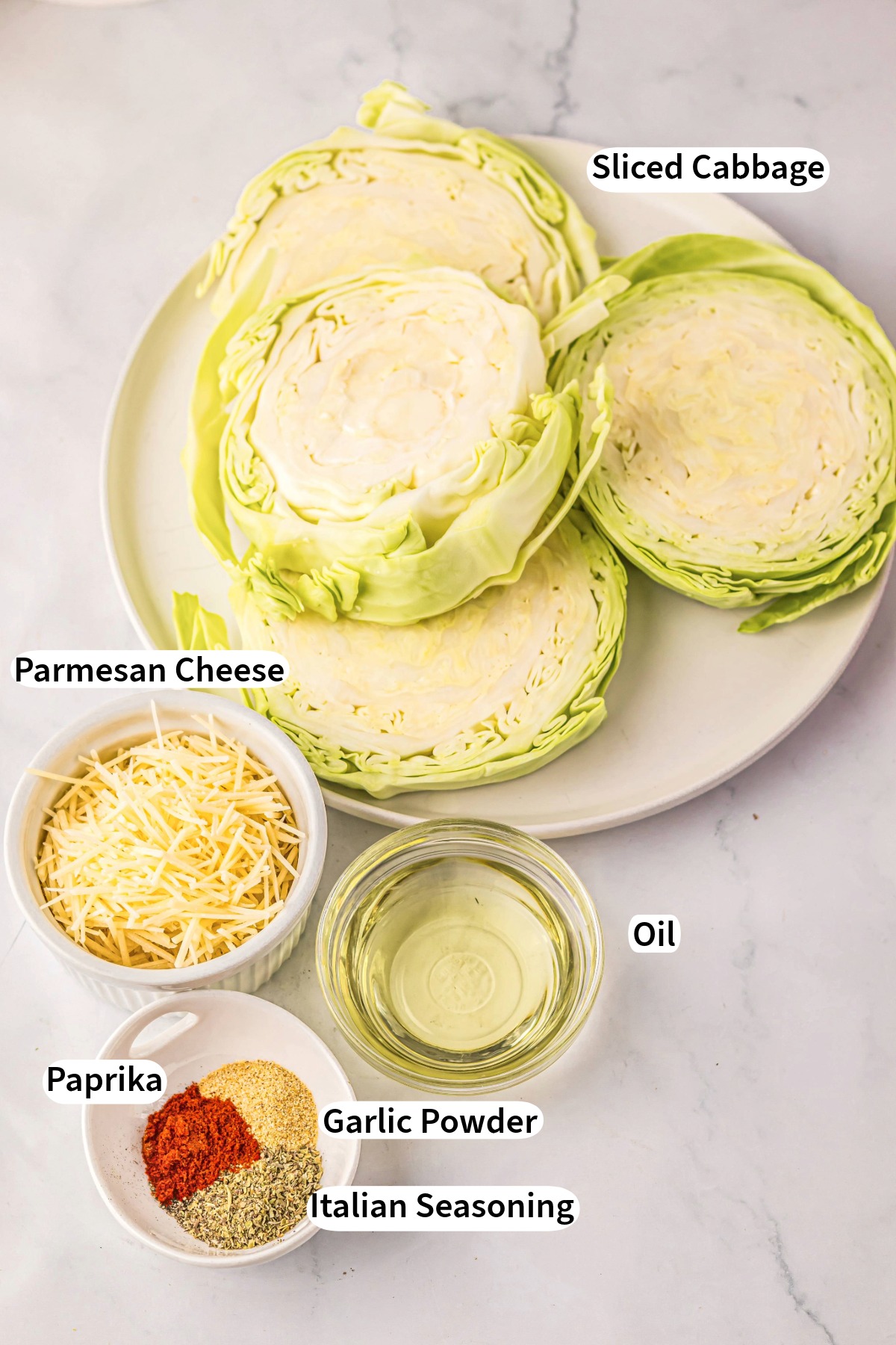 Ingredients to make parmesan roasted cabbage steaks.