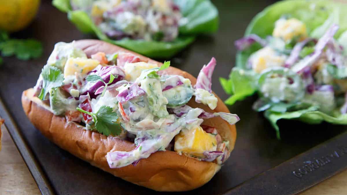 Lobster mango salad in a roll.