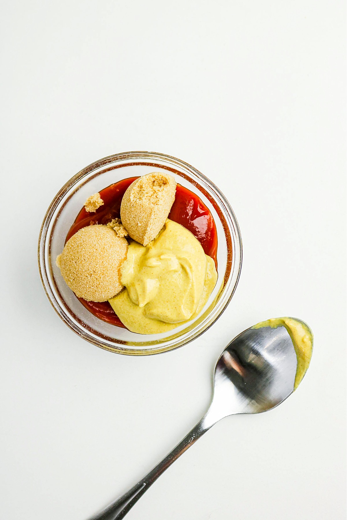 Ketchup Dijon glaze ingredients in a small mixing bowl.