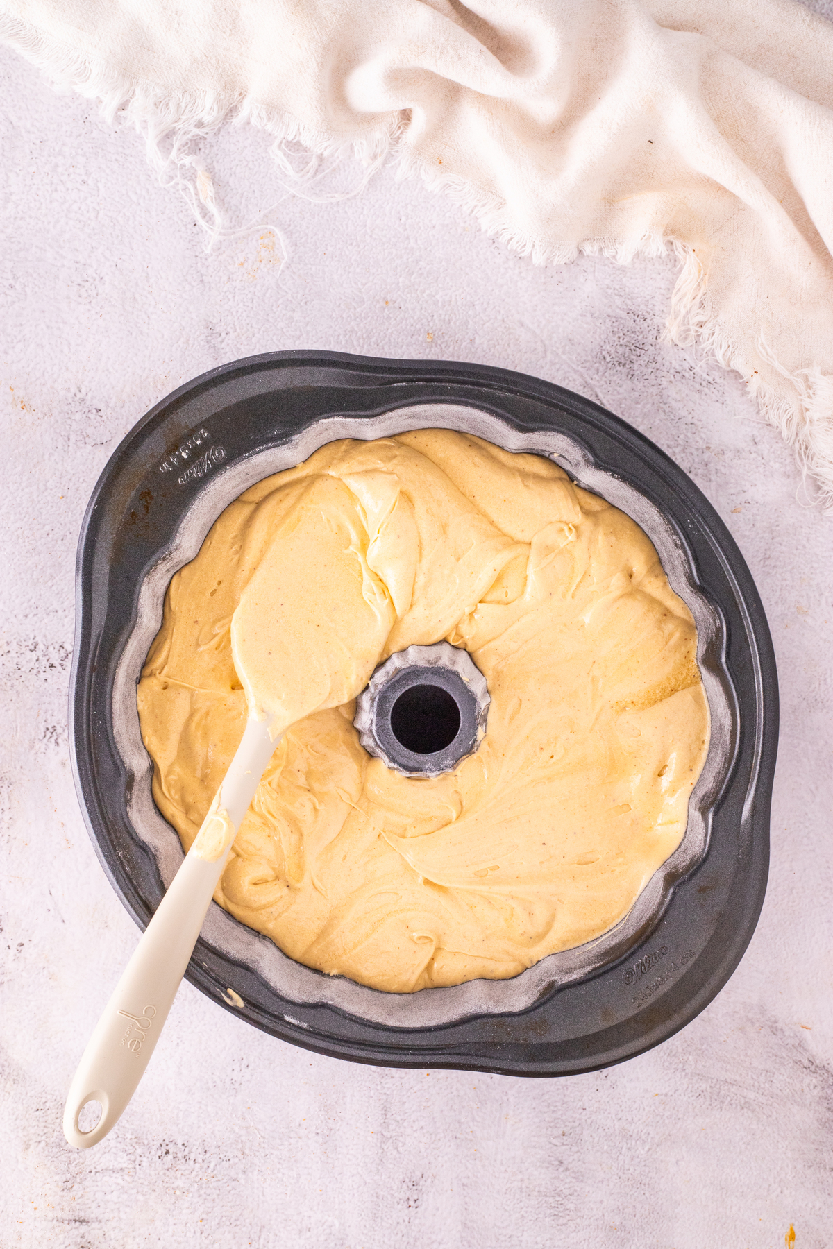 Mix batter into prepared bundt cake pan before baking.