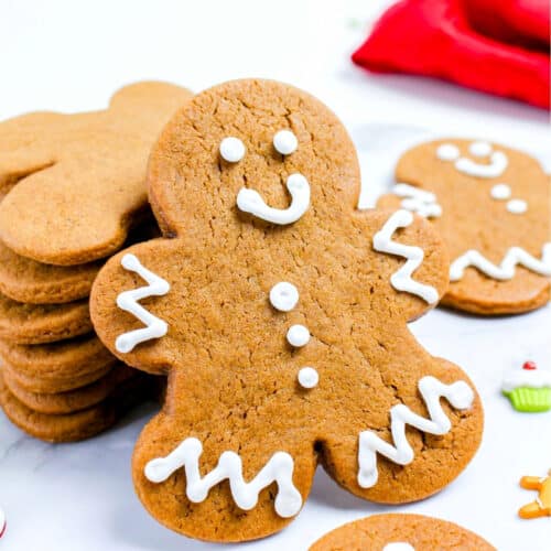 Gingerbread men cookies with royal icing smile.