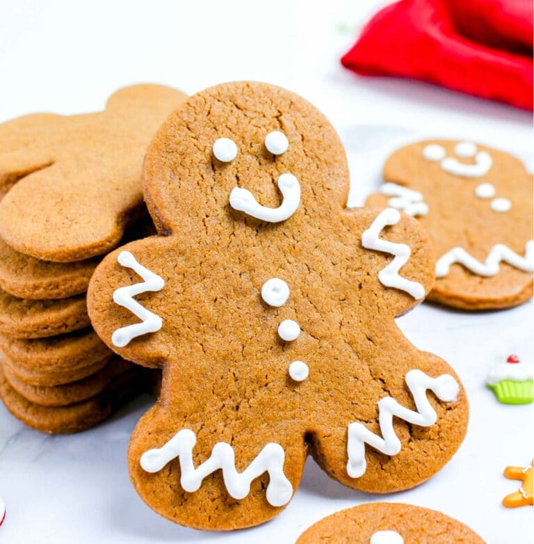 Gingerbread men cookies with royal icing smile.