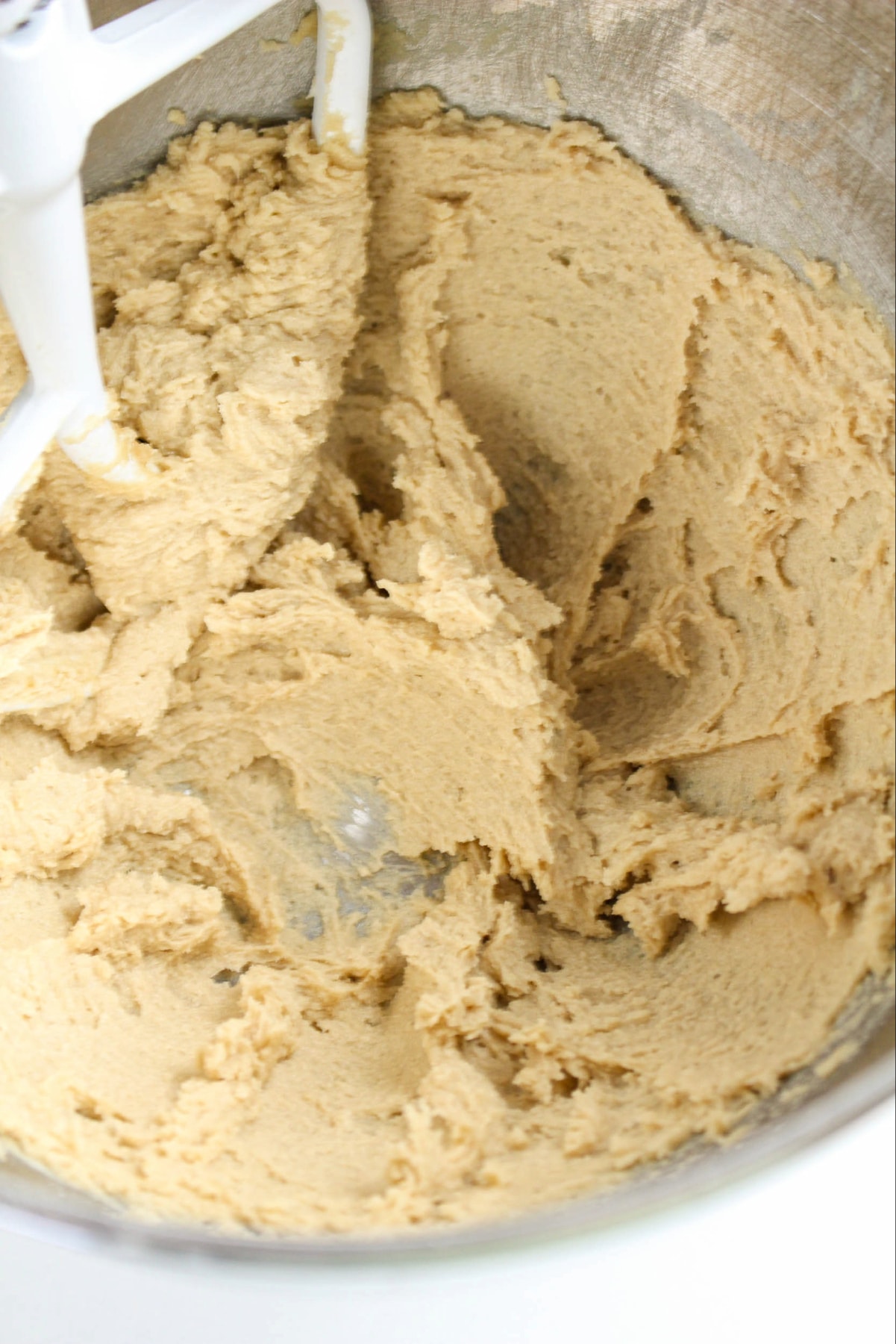 butter mixed with brown sugar in a stand mixer bowl.