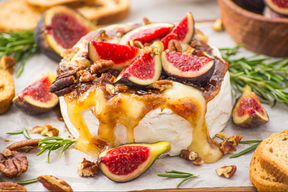 Gooey melted brie cheese with fresh sliced figs.