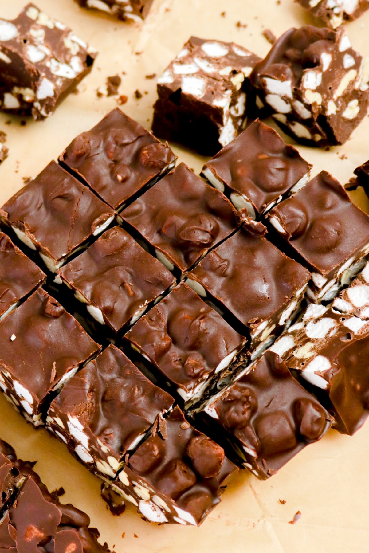 Overhead view of homemade rocky road on parchment paper.